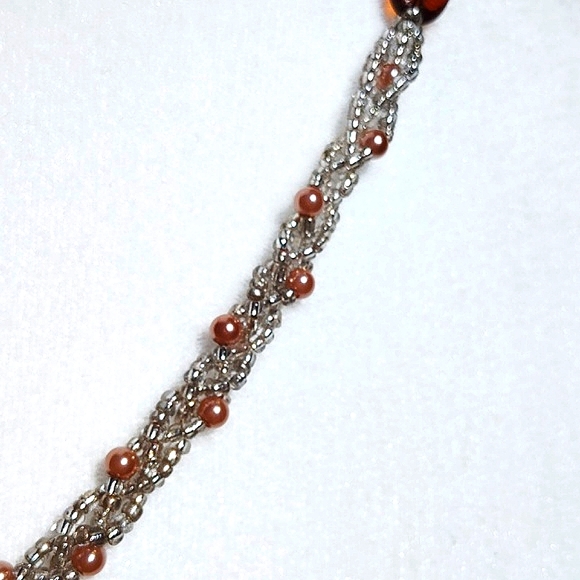 Seed bead braided necklace with faux pearl and amber colored acrylic beads - Picture 5 of 5